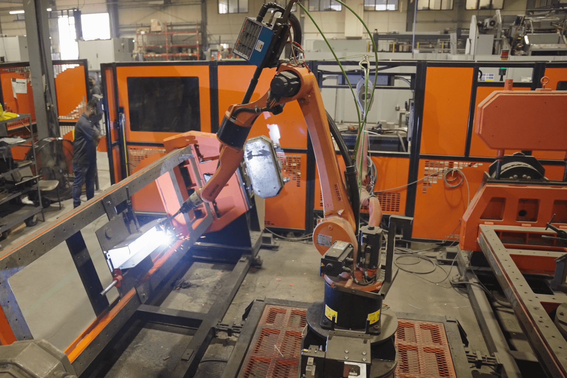 Part going through robotic welding at Malach